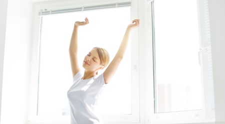 Girl stretching in the morningの写真素材