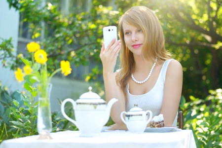 attractive girl talking on a cell phoneの写真素材
