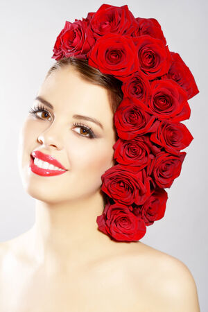 Portrait of beautiful girl with perfect makeup. light backgroundの写真素材