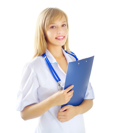 female doctor holding a notepad isolated on white backgroundの写真素材