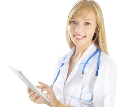 Female doctor with tablet pc isolated on white backgroundの写真素材