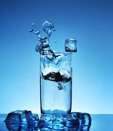 Ice water. Dark blue backgroundの写真素材