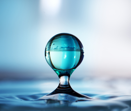 Water drop. Close-up. Light backgroundの写真素材