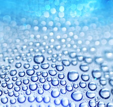 Water drops. Blue background of water dropsの写真素材