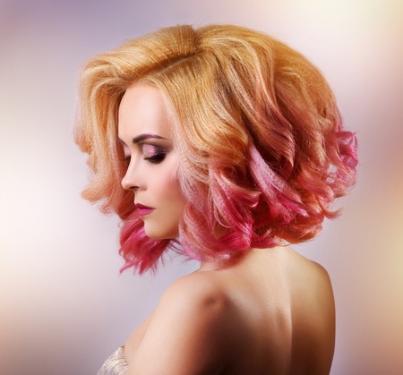 Beauty fashion model girl with colorful dyed hairの写真素材