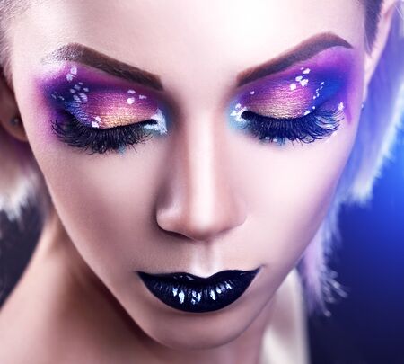 Beauty fashion model girl with colorful dyed hair. light backgroundの写真素材