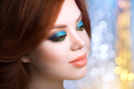 Girl with beautiful make-up on a light backgroundの写真素材