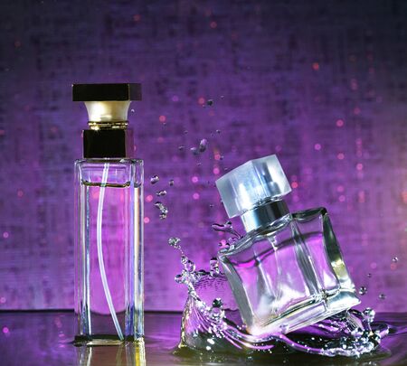  Perfume bottle on a purple backgroundの写真素材