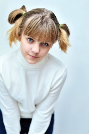  portrait of lovely teen girl with funny hairstyleの写真素材