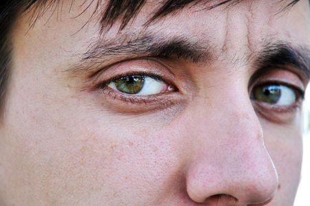 man eyes close-up portraitの写真素材