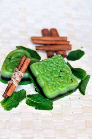   Natural, nontoxic handmade soap bars with adittion of mint and  cinnamonの写真素材