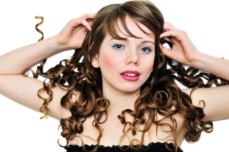 face of laying girl  with long curly hairの写真素材
