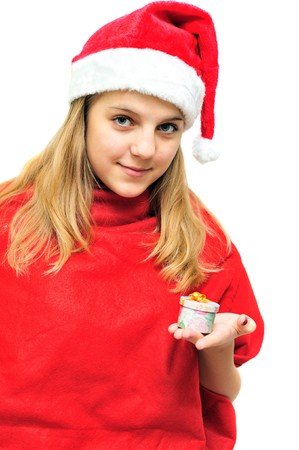 teen santa girl with little present in handの写真素材