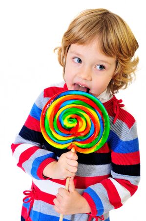 studio shoot of girl with huge lollipop の写真素材