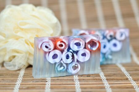 Handmade beautiful soaps with bast wispの写真素材