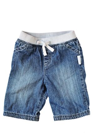 baby jeans on over the white backgroundの写真素材