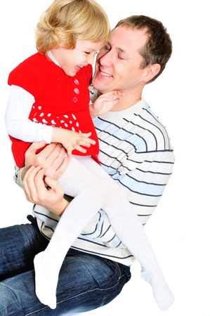 father and daughter hugging each other and playingの写真素材