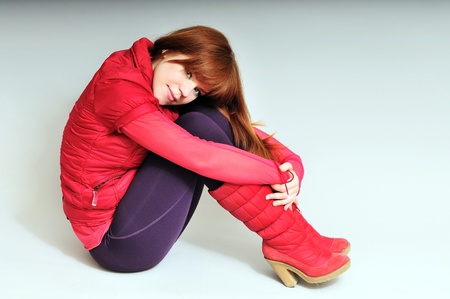 redheaded girl wearing  red clothesの写真素材