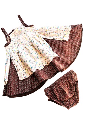 baby's set of panties and dress on over the whiteの写真素材