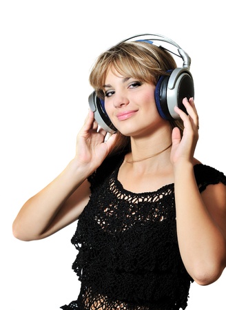 happy lovely teen girl dancing with headphonesの写真素材