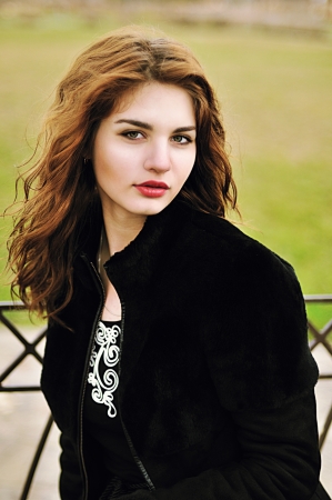 Portrait of young beautiful girl in windy weatherの写真素材
