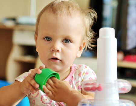 baby girl  playing toys at home