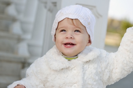 funny smile of baby girlの写真素材