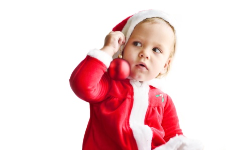 surprised little santa helper over the whiteの写真素材