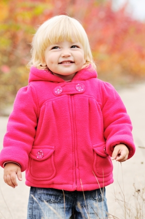 cunning baby girl with dimple cheeksの写真素材