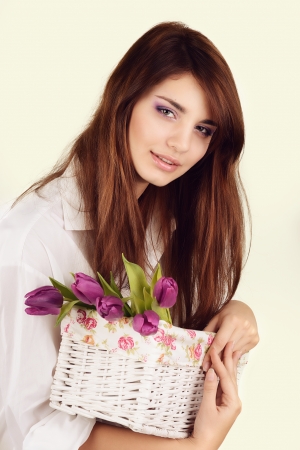 Beautiful tender girl with tulipsの写真素材