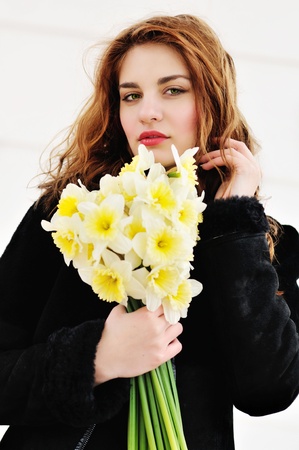 green eyed girl with flowersの写真素材