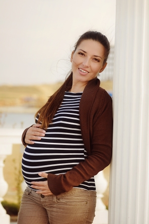 happy pregnance in warm tonesの写真素材