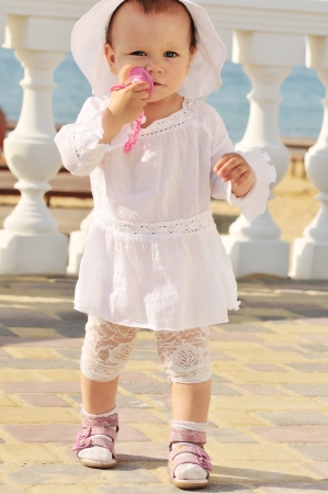 fashion baby doing her first stepsの写真素材