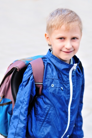 portrait of schoolboy with backpackの写真素材