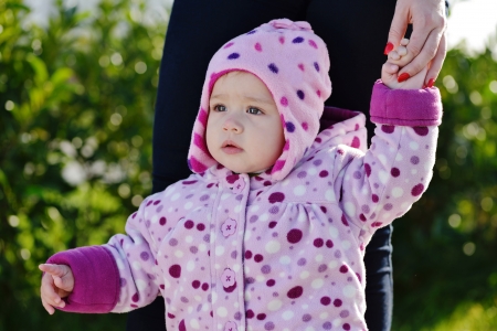 baby on the walk showing where to goの写真素材