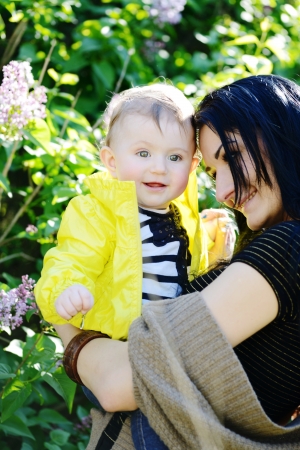 mother and baby daughter  in spring timeの写真素材