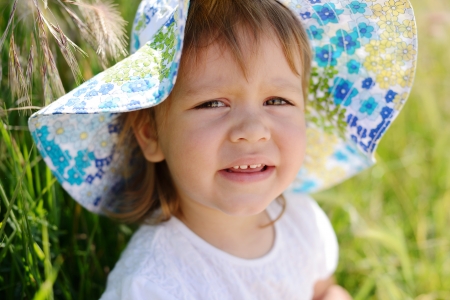 summer toddler girl in wheat fieldの写真素材