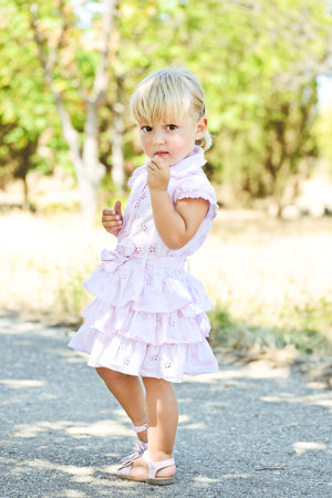 summer fashion toddler  girl on the walkの写真素材