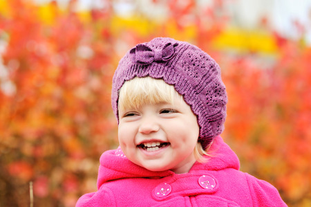baby girl smiling with dimple cheeksの写真素材
