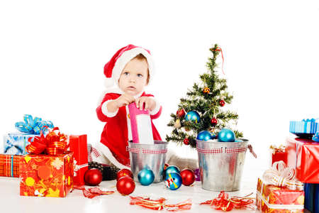little Santa helper preparing for christmassの写真素材