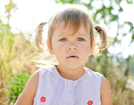 toddler girl with funny hairstyleの写真素材