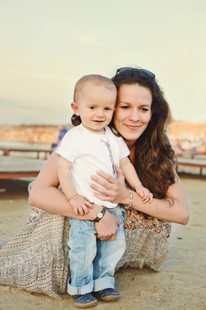 mother and her baby son outdoorsの写真素材