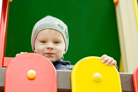 toddler boy on the playgroundの写真素材