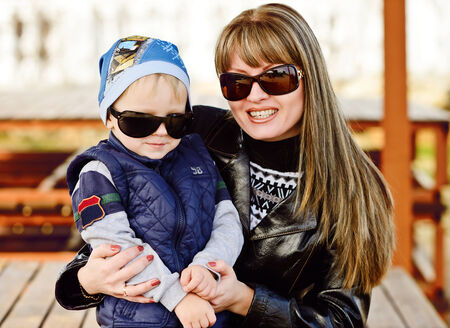 happy mother and son wearing sunglassesの写真素材