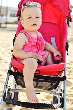 fashion baby on the sea in strollerの写真素材