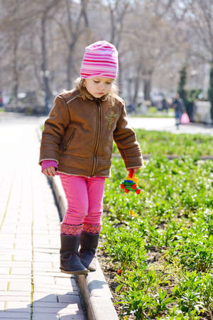 Balance walking of toddler girlの写真素材