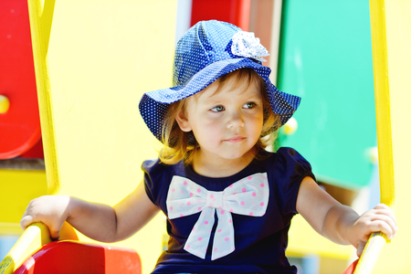 cute toddler on the playgroundの写真素材