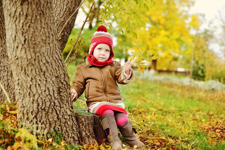 bright autumn for toddler girlの写真素材