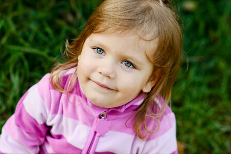 portrait of sweet toddler girlの写真素材