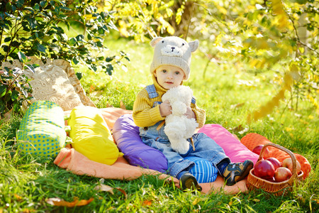baby boy on the sunny meadowの写真素材